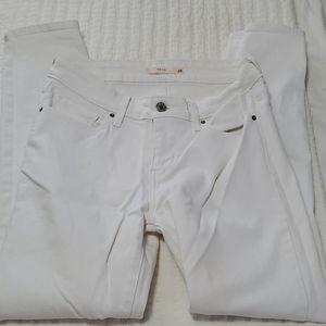 712 Slim White Levi's